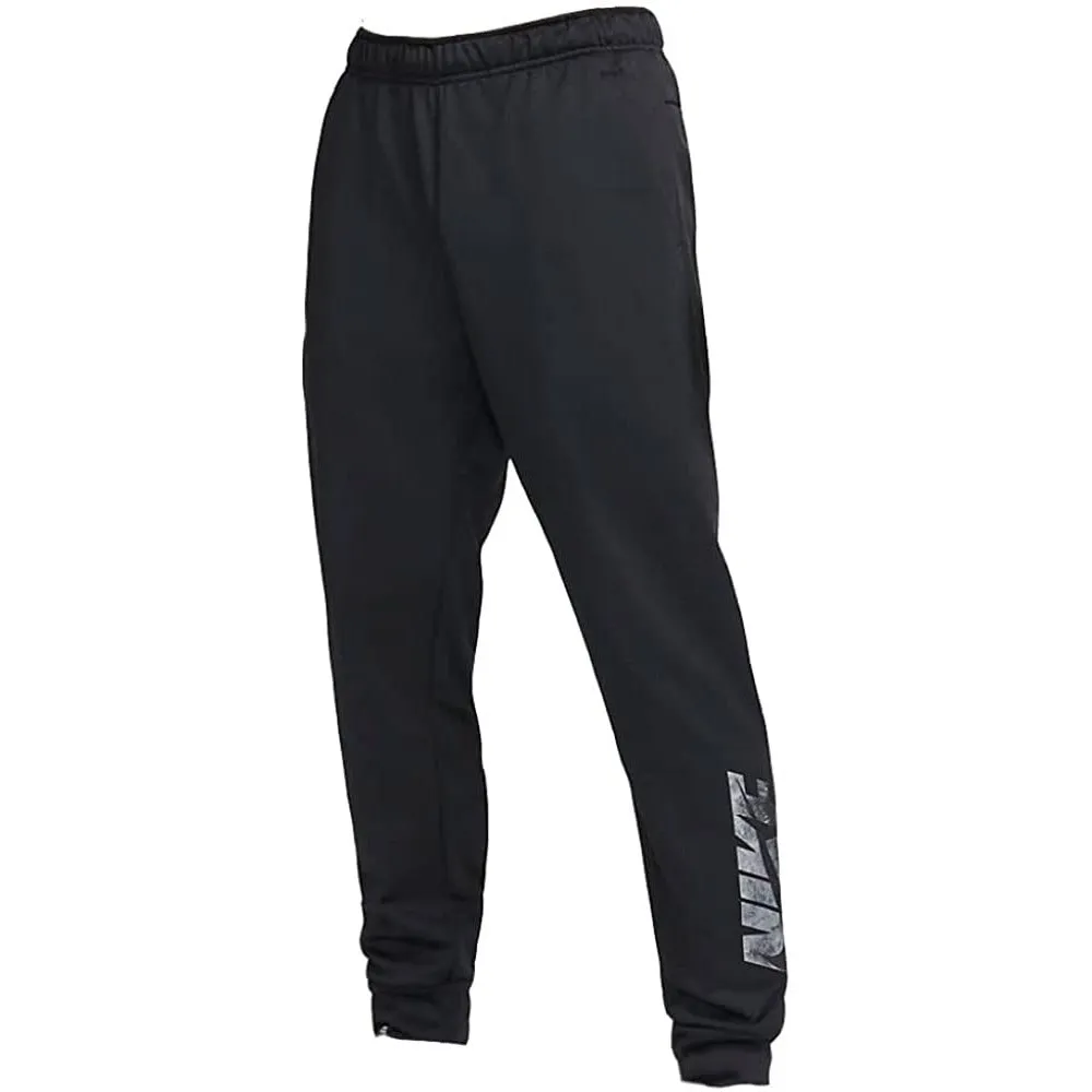 Pantalon de jogging Nike Homme Noir Uni à coupe fuselée avec logo Swoosh et technologie Therma Fit
